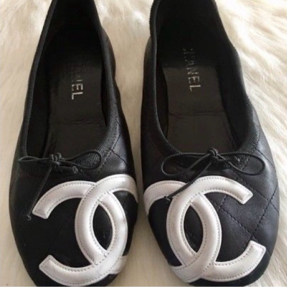 CHANEL Quilted Black and White Loafers 
ISO!!